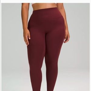 Size 6 Lululemon align with pockets in Red merlot. 28in inseam.